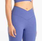close up of criss-cross waistband of ButterBod Hourglass Leggings in color perwinkle blue