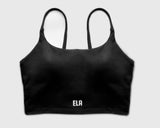 Flatlay image of a black sports bra with internal structure of built-in bra pads for maximum support during high intensity workout